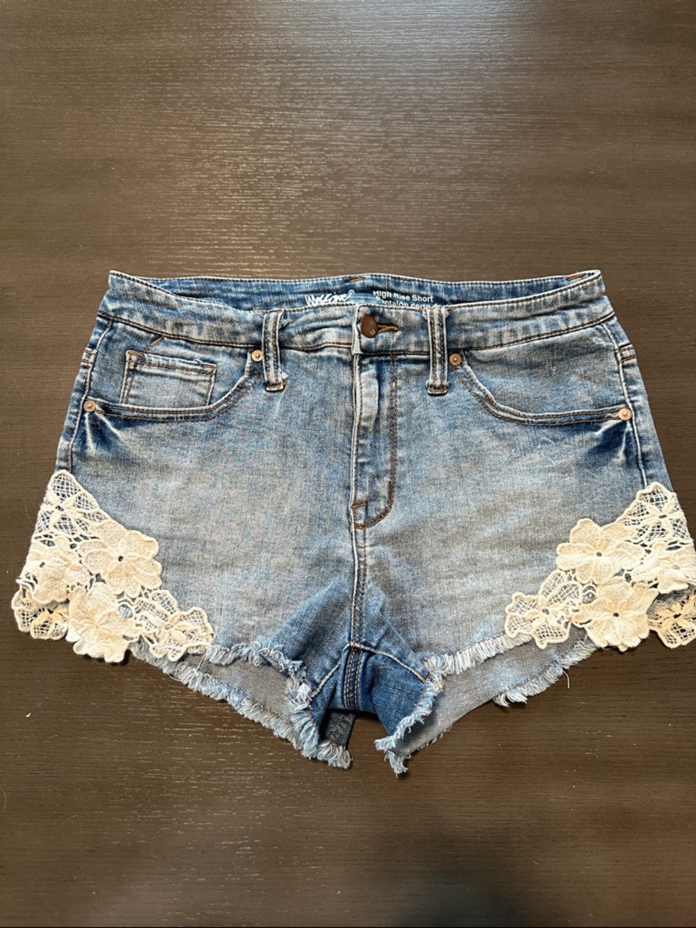 Mossimo denim high rise blue jean shorts with lace detail, size 10
